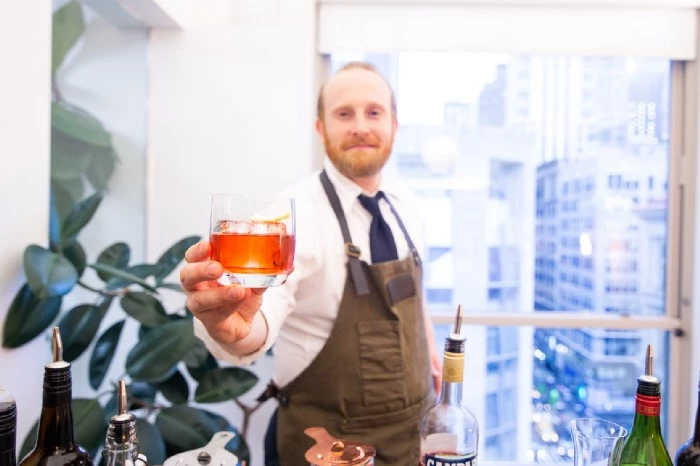 Bartender holding cocktail