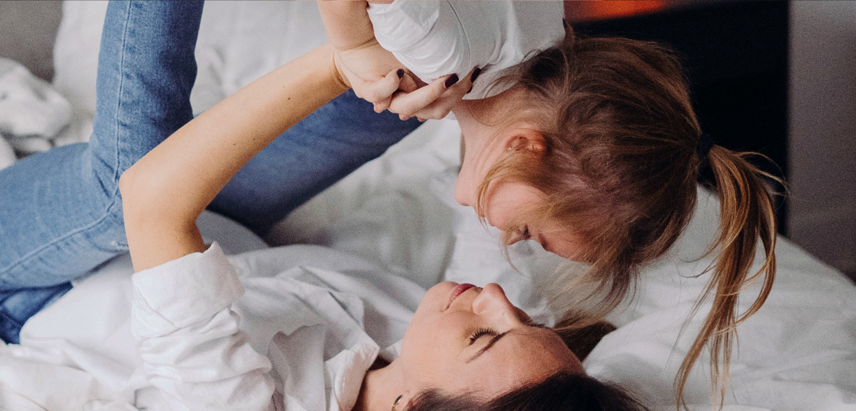 mother and daughter playing