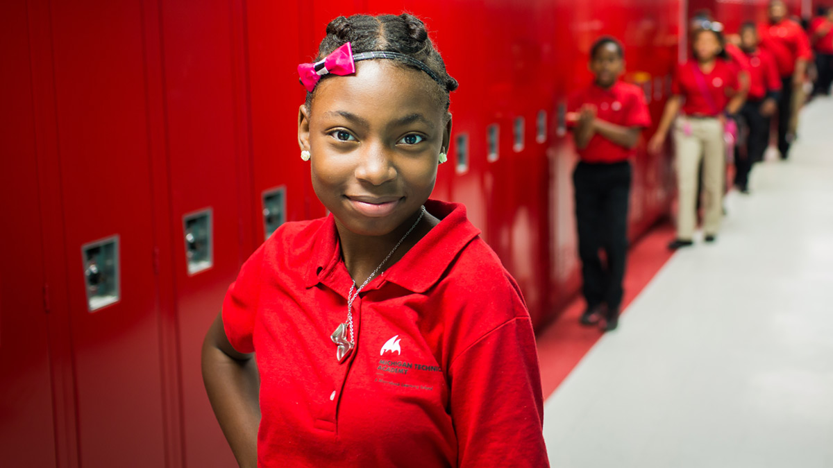 girl smiling at locker